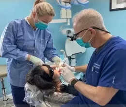 Dentist performing a dental procedure at R&S Dental Associates in Clifton, NJ.