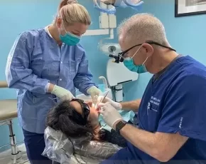 Dentist providing dental care at R&S Dental Associates in Clifton, NJ.